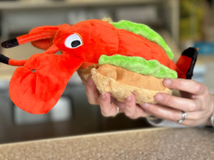 Lobster roll dog toy