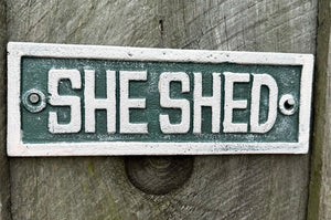 She shed sign